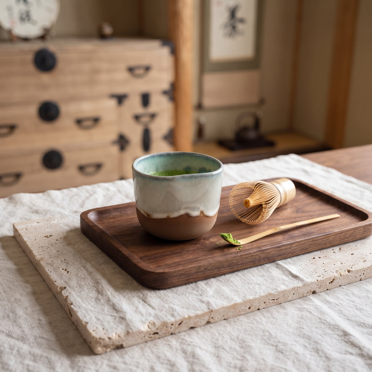 LyLceramics Stone Shot cup styled with dried botanicals on an artisanal wooden serving board.